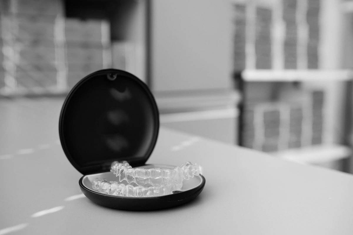 Invisalign clear aligners offered at Smiles on Elston